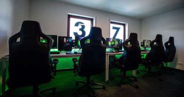 Five unoccupied gaming setups.