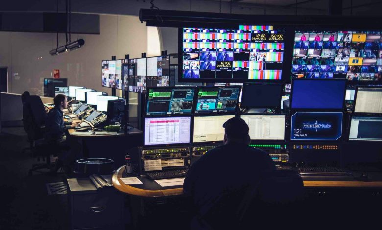 People in a control room.