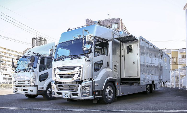Stationary outside broadcast vans
