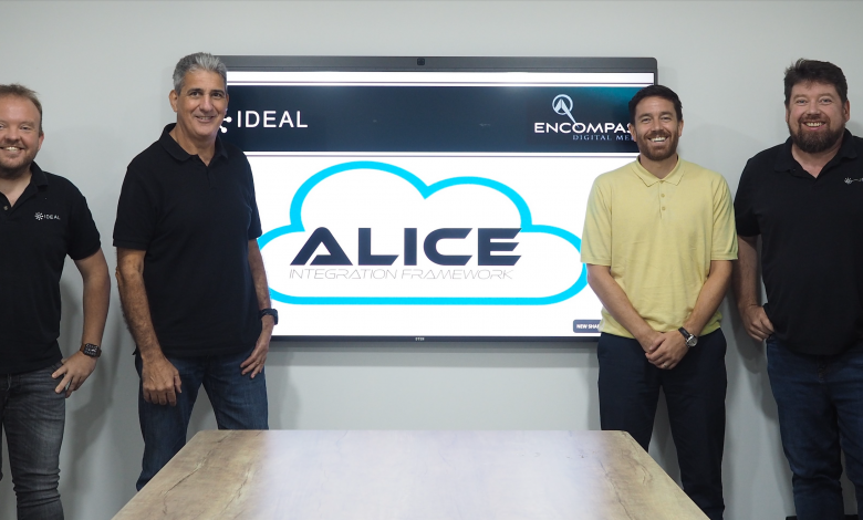 Representatives from Ideal Systems and Encompass Digital Media pose for picture