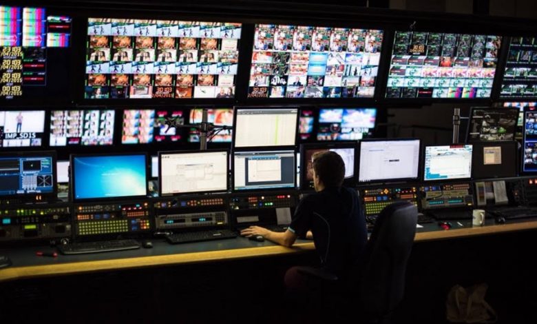 Man sitting in master control room