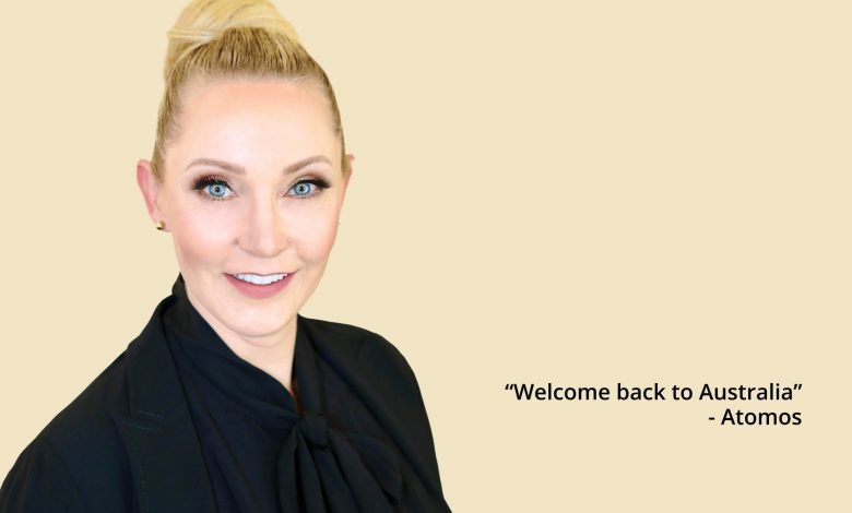 Image of a caucasian woman with blond hair and black clothes